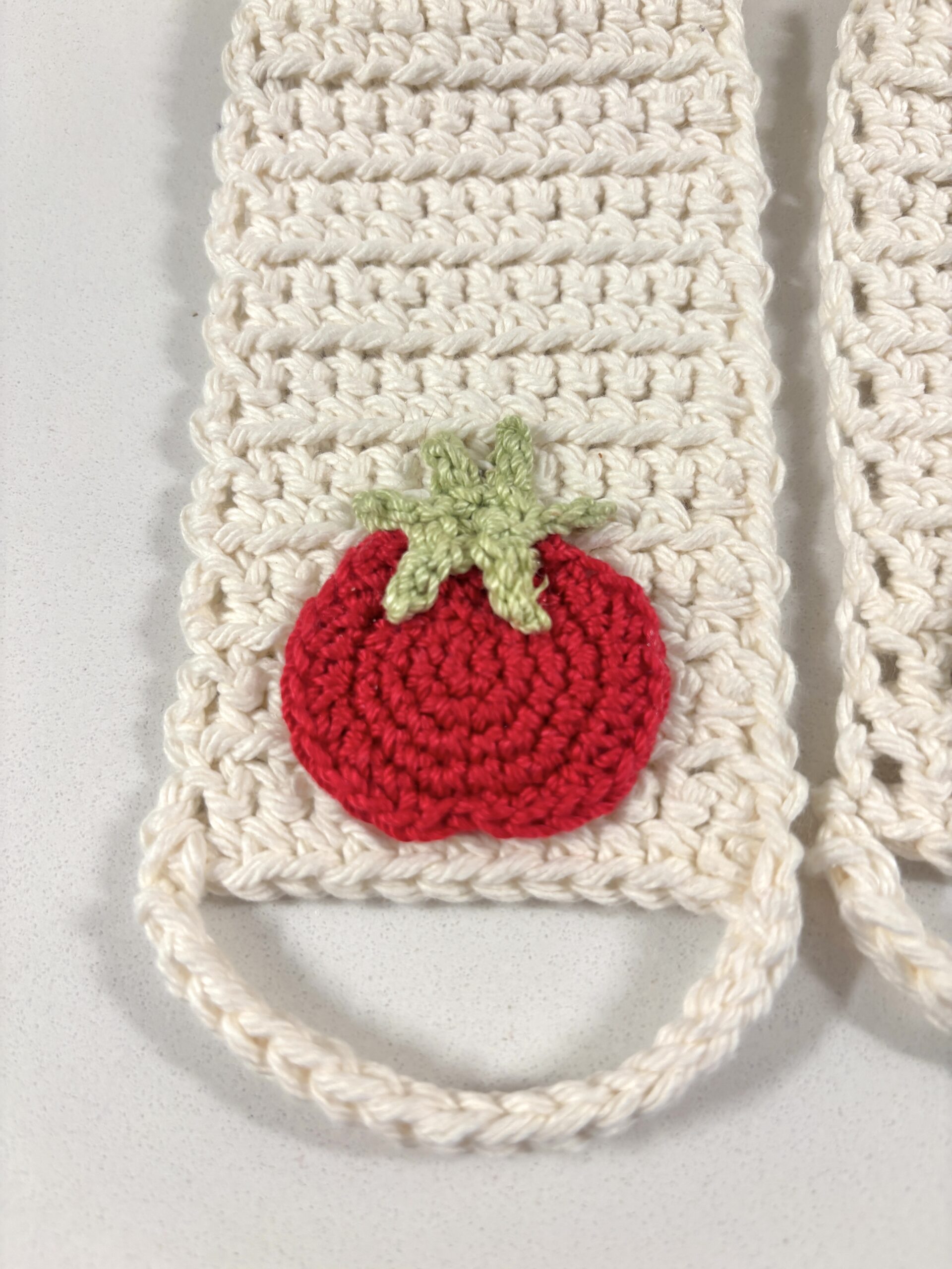 crochet kitchen towel holder with tomato design