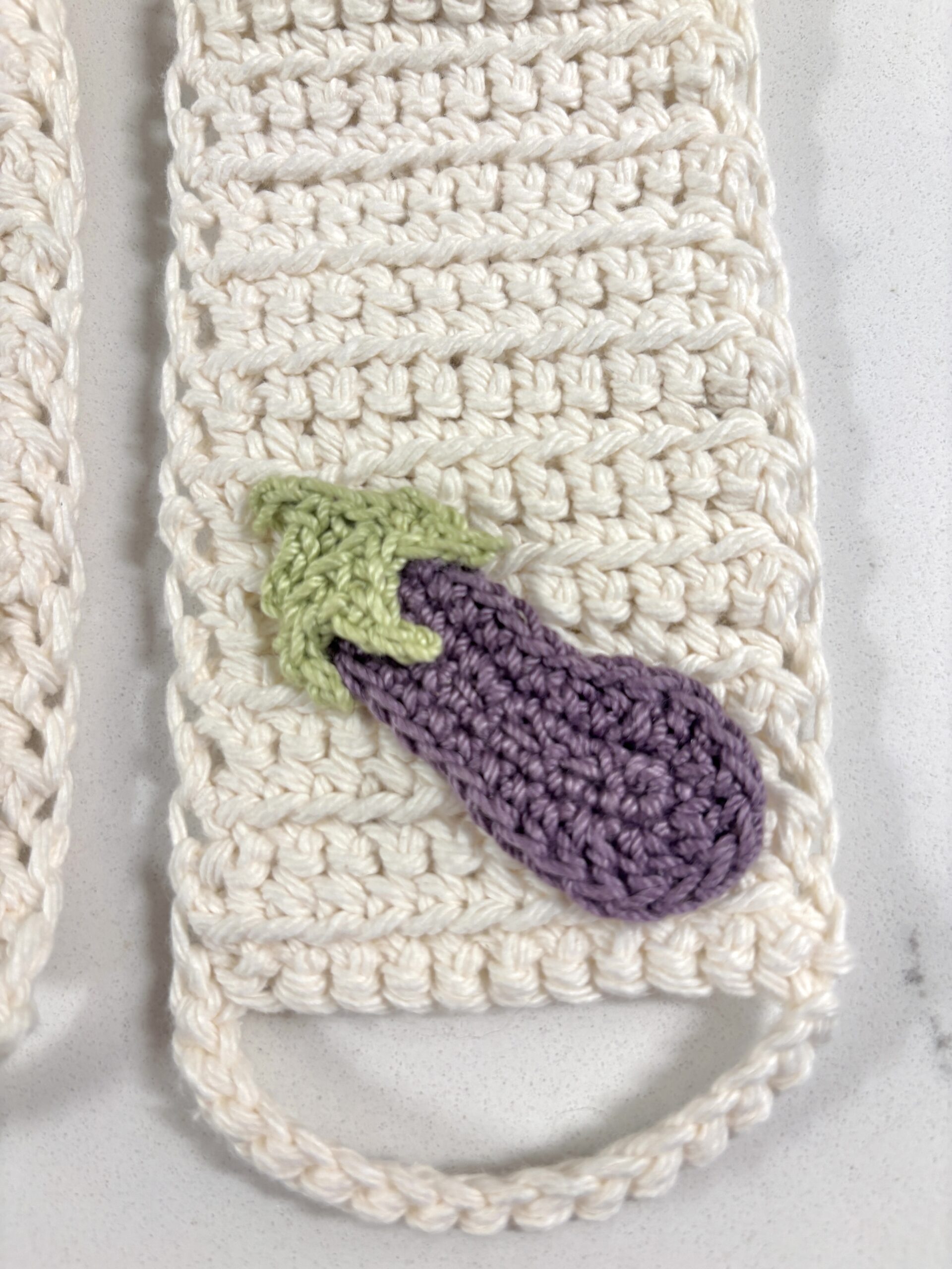 crochet kitchen towel holder with eggplant design