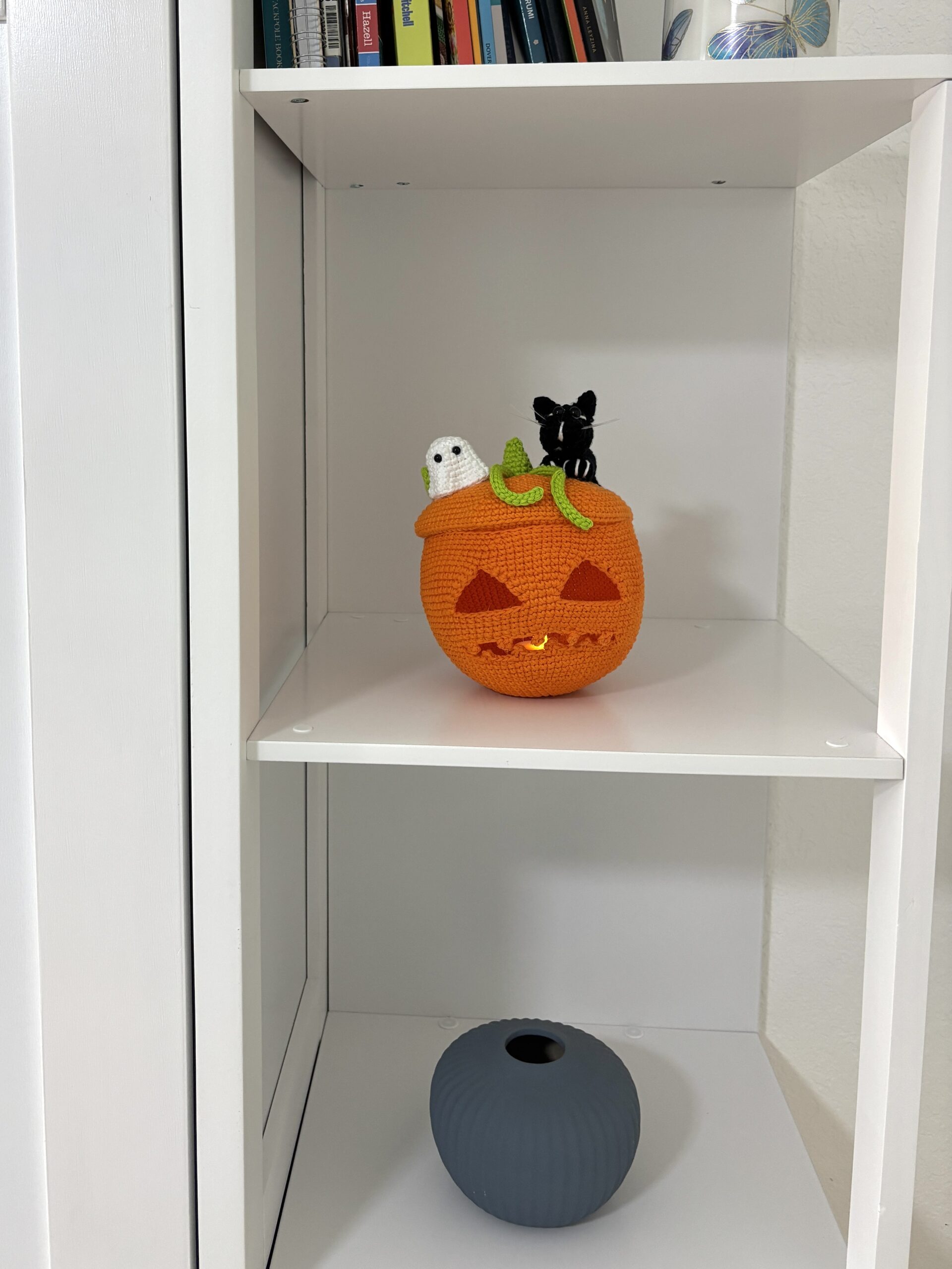 crochet jack o lantern on shelf